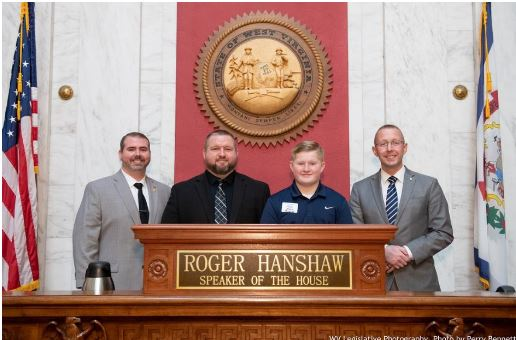 Mason County Delegate Johnnie Wamsley, Pastor Bo Burgess, Nate Burgess, and Mason County Delegate Jonathan Pinson. Pastor Bo Burgess and his oldest son Nate, are pictured with Mason County Delegates during page day